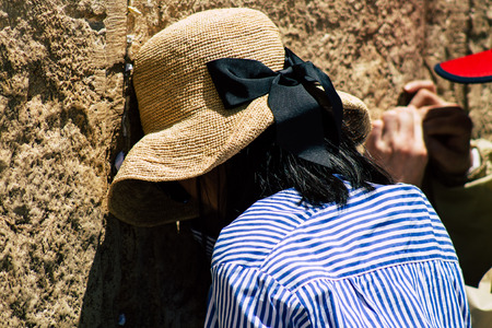 Jerusalem Israel June 24, 2019 View of unknown Israeli woman praying at the Western wall in the Old...