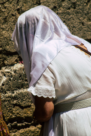 Jerusalem Israel June 24, 2019 View of unknown Israeli woman praying at the Western wall in the Old city of Jerusalem in the afternoonのeditorial素材