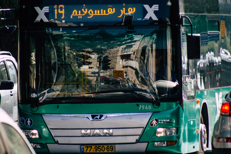 Jerusalem Israel June 24, 2019 View of traditional city bus rolling in the streets of Jerusalem in the afternoonのeditorial素材
