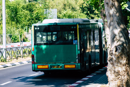 Jerusalem Israel June 24, 2019 View of traditional city bus rolling in the streets of Jerusalem in the afternoonのeditorial素材