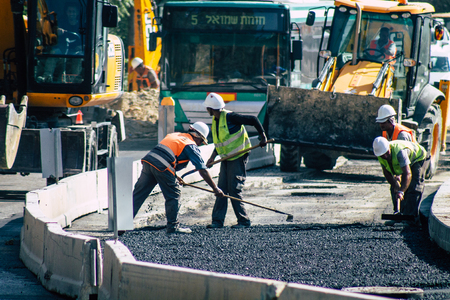 Jerusalem Israel June 24, 2019 View of worker building a new road in Jerusalem in the afternoonのeditorial素材