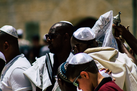 Jerusalem Israel June 24, 2019 View of young Israeli child walking front the Western wall in the Old city of Jerusalem in the afternoonのeditorial素材
