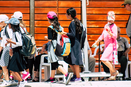 Jerusalem Israel June 24, 2019 View of young Israeli child walking front the Western wall in the Old city of Jerusalem in the afternoonのeditorial素材