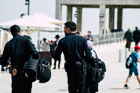 Jerusalem Israel June 24, 2019 View of Israeli police walking front the Western wall at the Old city of Jerusalem in the afternoonのeditorial素材