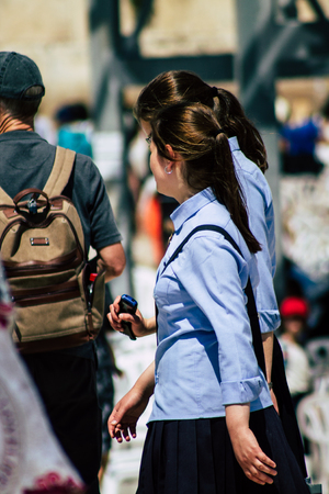 Jerusalem Israel June 24, 2019 View of unknown orthodox Israeli woman walking front the Western wall in the Old city of Jerusalem in the afternoonのeditorial素材