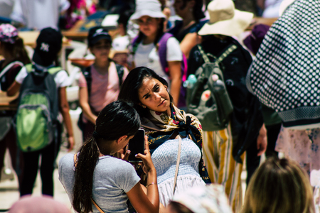Jerusalem Israel June 24, 2019 View of unknown orthodox Israeli woman walking front the Western wall in the Old city of Jerusalem in the afternoonのeditorial素材