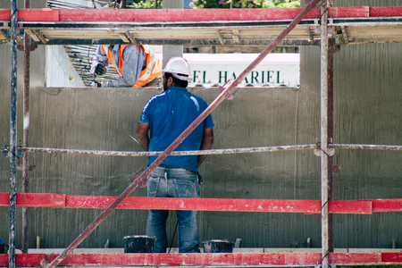 Jerusalem Israel June 24, 2019 View of unknown Israeli worker building a permanent pluralistic prayer pavilion front the Western wall in the Old city of Jerusalem in the afternoonのeditorial素材