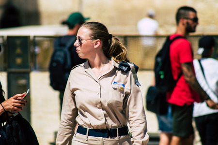 Jerusalem Israel July 2, 2019 View of Israeli police walking front the Western wall at the Old city of Jerusalem in the afternoonのeditorial素材