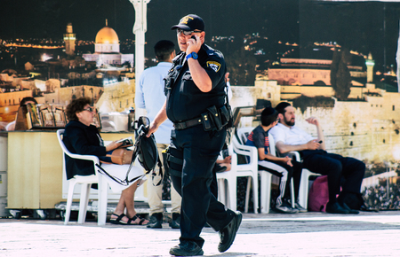 Jerusalem Israel July 2, 2019 View of Israeli police walking front the Western wall at the Old city of Jerusalem in the afternoonのeditorial素材