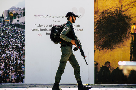 Jerusalem Israel July 2, 2019 View of Israeli police walking front the Western wall at the Old city of Jerusalem in the afternoonのeditorial素材