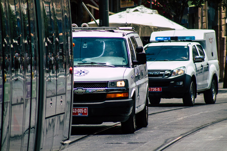 Jerusalem Israel July 2, 2019 View of a Israeli police car rolling in the streets of Jerusalem in the afternoonのeditorial素材