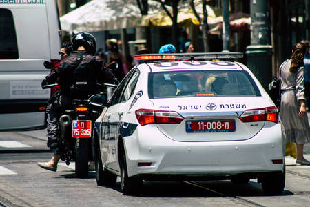 Jerusalem Israel July 2, 2019 View of a Israeli police car rolling in the streets of Jerusalem in the afternoonのeditorial素材