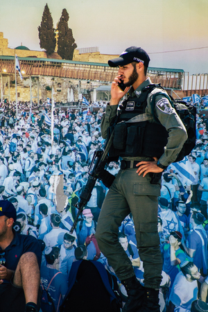 Jerusalem Israel July 2, 2019 View of Israeli police walking front the Western wall at the Old city of Jerusalem in the afternoonのeditorial素材