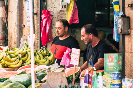Jerusalem Israel July 3, 2019 View of unknown Israeli seller working at Mahane Yehuda Market in...