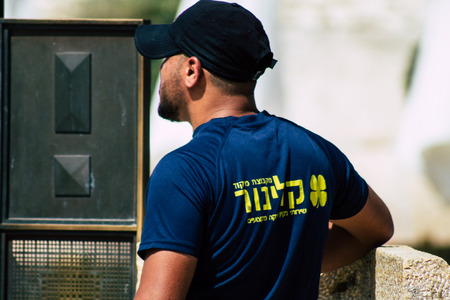 Jerusalem Israel July 3, 2019 View of unknown cleaner walking front the Western Wall at the Old city of Jerusalem in the morningのeditorial素材