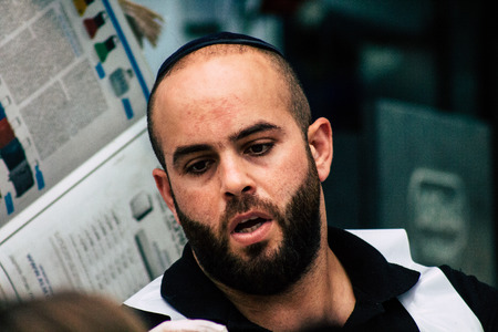 Jerusalem Israel July 3, 2019 View of unknown Israeli seller working at Mahane Yehuda Market in Jerusalem in the morningのeditorial素材