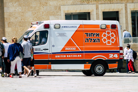 Jerusalem Israel July 3, 2019 View of a Israeli ambulance rolling front the Western Wall in the Old city of Jerusalem in the afternoonのeditorial素材