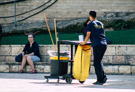 Jerusalem Israel July 3, 2019 View of unknown cleaner walking front the Western Wall at the Old city of Jerusalem in the morningのeditorial素材