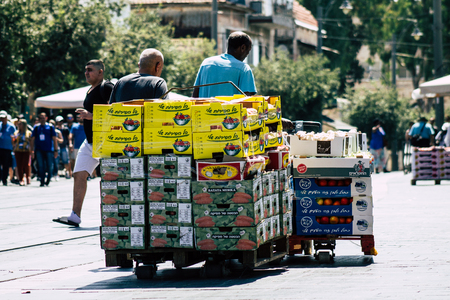 Jerusalem Israel July 3, 2019 View of unknown Israeli seller working at Mahane Yehuda Market in Jerusalem in the morningのeditorial素材