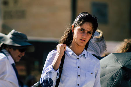 Jerusalem Israel July 4, 2019 View of unknown Israeli people walking front the Western wall in the Old city of Jerusalem in the afternoonのeditorial素材