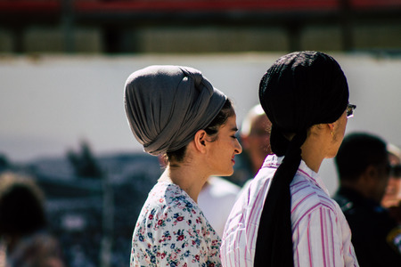 Jerusalem Israel July 4, 2019 View of unknown Israeli people walking front the Western wall in the Old city of Jerusalem in the afternoonのeditorial素材