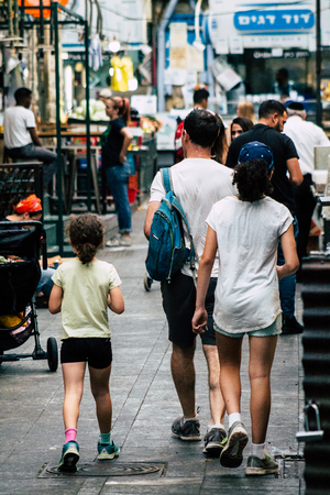 Jerusalem Israel July 3, 2019 View of unknowns Israeli people walking and shopping at the Mahane Yehuda Market in Jerusalem in the morningのeditorial素材