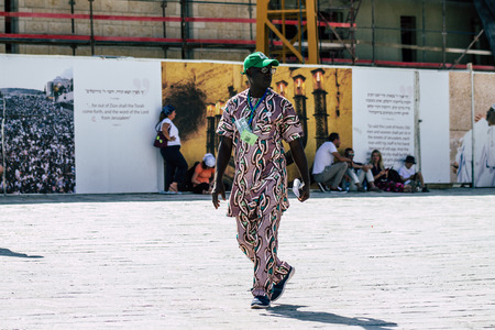 Jerusalem Israel July 4, 2019 View of unknown Israeli people walking front the Western wall in the Old city of Jerusalem in the afternoonのeditorial素材