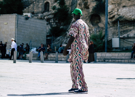 Jerusalem Israel July 4, 2019 View of unknown Israeli people walking front the Western wall in the Old city of Jerusalem in the afternoonのeditorial素材