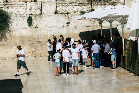 Jerusalem Israel July 4, 2019 View of unknown Israeli man praying at the Western wall in the Old city of Jerusalem in the afternoonのeditorial素材