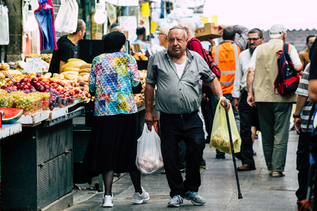 Jerusalem Israel July 3, 2019 View of unknowns Israeli people walking and shopping at the Mahane Yehuda Market in Jerusalem in the morningのeditorial素材
