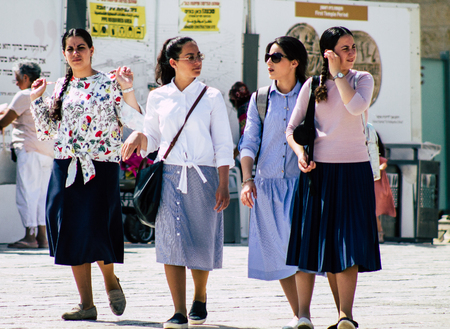 Jerusalem Israel July 4, 2019 View of unknown Israeli people walking front the Western wall in the Old city of Jerusalem in the afternoonのeditorial素材