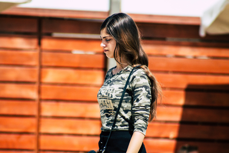 Jerusalem Israel July 4, 2019 View of unknown Israeli teen walking front the Western wall in the Old city of Jerusalem in the afternoonのeditorial素材