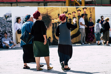 Jerusalem Israel July 4, 2019 View of unknown Israeli people walking front the Western wall in the Old city of Jerusalem in the afternoonのeditorial素材