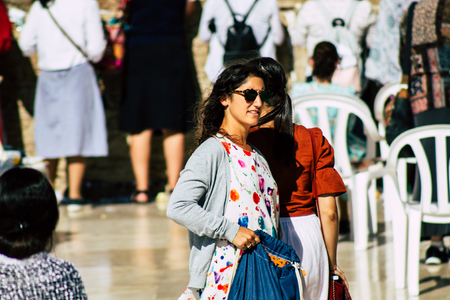 Jerusalem Israel July 4, 2019 View of unknown Israeli people walking front the Western wall in the Old city of Jerusalem in the afternoonのeditorial素材