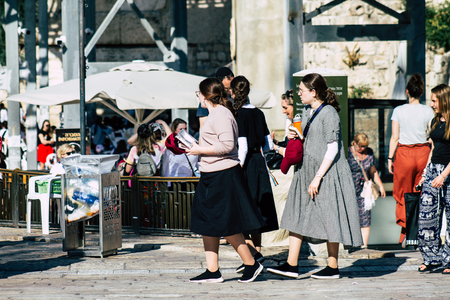 Jerusalem Israel July 4, 2019 View of unknown Israeli people walking front the Western wall in the Old city of Jerusalem in the afternoonのeditorial素材