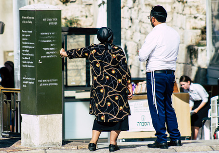 Jerusalem Israel July 4, 2019 View of unknown Israeli people walking front the Western wall in the Old city of Jerusalem in the afternoonのeditorial素材