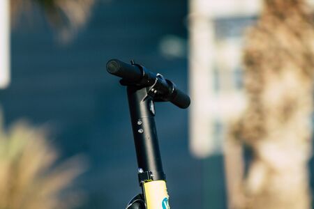 Tel Aviv Israel July 6, 2019 View of a electric scooter parked in the streets of Tel Aviv in the afternoonの写真素材