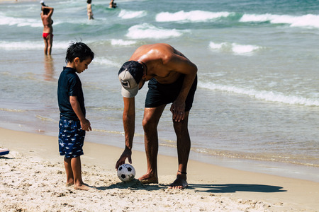 Tel Aviv Israel July 6, 2019 View of unknown Israeli people having fun on the beach of Tel Aviv...