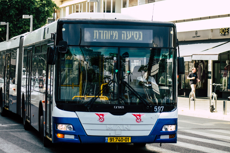 Tel Aviv Israel July 8, 2019 View of traditional city bus rolling in the streets of Tel Aviv in the afternoonのeditorial素材