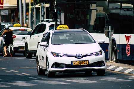 Tel Aviv Israel July 8, 2019 View of traditional Israeli taxi rolling in the streets of Tel Aviv in the afternoonのeditorial素材