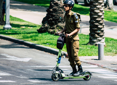 Tel Aviv Israel July 7, 2019 View of unknown Israeli people rolling with a electric scooter in the...