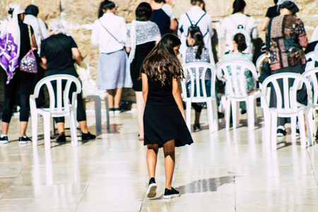 Jerusalem Israel June 24, 2019 View of unknown Israeli woman praying at the Western wall in the Old city of Jerusalem in the afternoonのeditorial素材