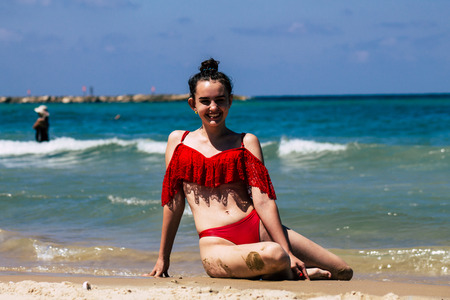 Tel Aviv Israel July 6, 2019 View of unknown teen having fun on the beach of Tel Aviv during a sunny...