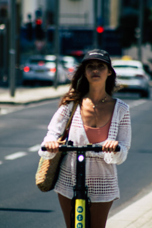 Tel Aviv Israel July 7, 2019 View of unknown Israeli people rolling with a electric scooter in the streets of Tel Aviv in the afternoonのeditorial素材
