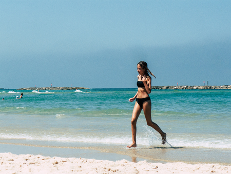 Tel Aviv Israel July 11, 2019 View of unknown Israeli people having fun on the beach of Tel Aviv during a sunny day in the afternoonのeditorial素材