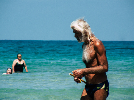 Tel Aviv Israel July 11, 2019 View of unknown Israeli people having fun on the beach of Tel Aviv during a sunny day in the afternoonのeditorial素材
