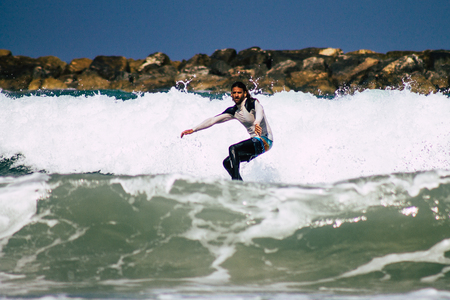 Tel Aviv Israel July 9, 2019 View of unknown Israeli people practicing surfing on Tel Aviv beach in...