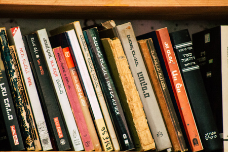Tel Aviv Israel July 21, 2019 View of an ample selection of used Hebrew and English books in a warm, comfy space with a cafe and a patio located at The Little Prince bookshop in Tel Avivのeditorial素材