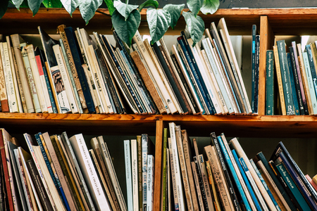 Tel Aviv Israel July 21, 2019 View of an ample selection of used Hebrew and English books in a warm, comfy space with a cafe and a patio located at The Little Prince bookshop in Tel Avivのeditorial素材