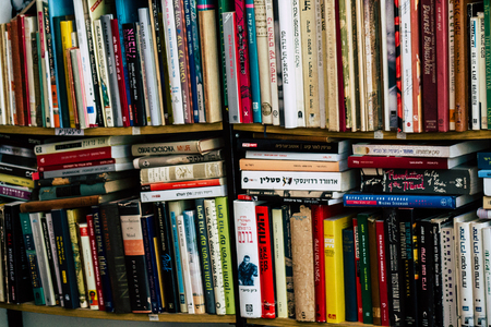Tel Aviv Israel July 21, 2019 View of an ample selection of used Hebrew and English books in a warm, comfy space with a cafe and a patio located at The Little Prince bookshop in Tel Avivのeditorial素材